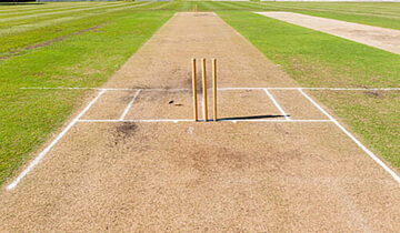 Qual é o comprimento de um campo de críquete?